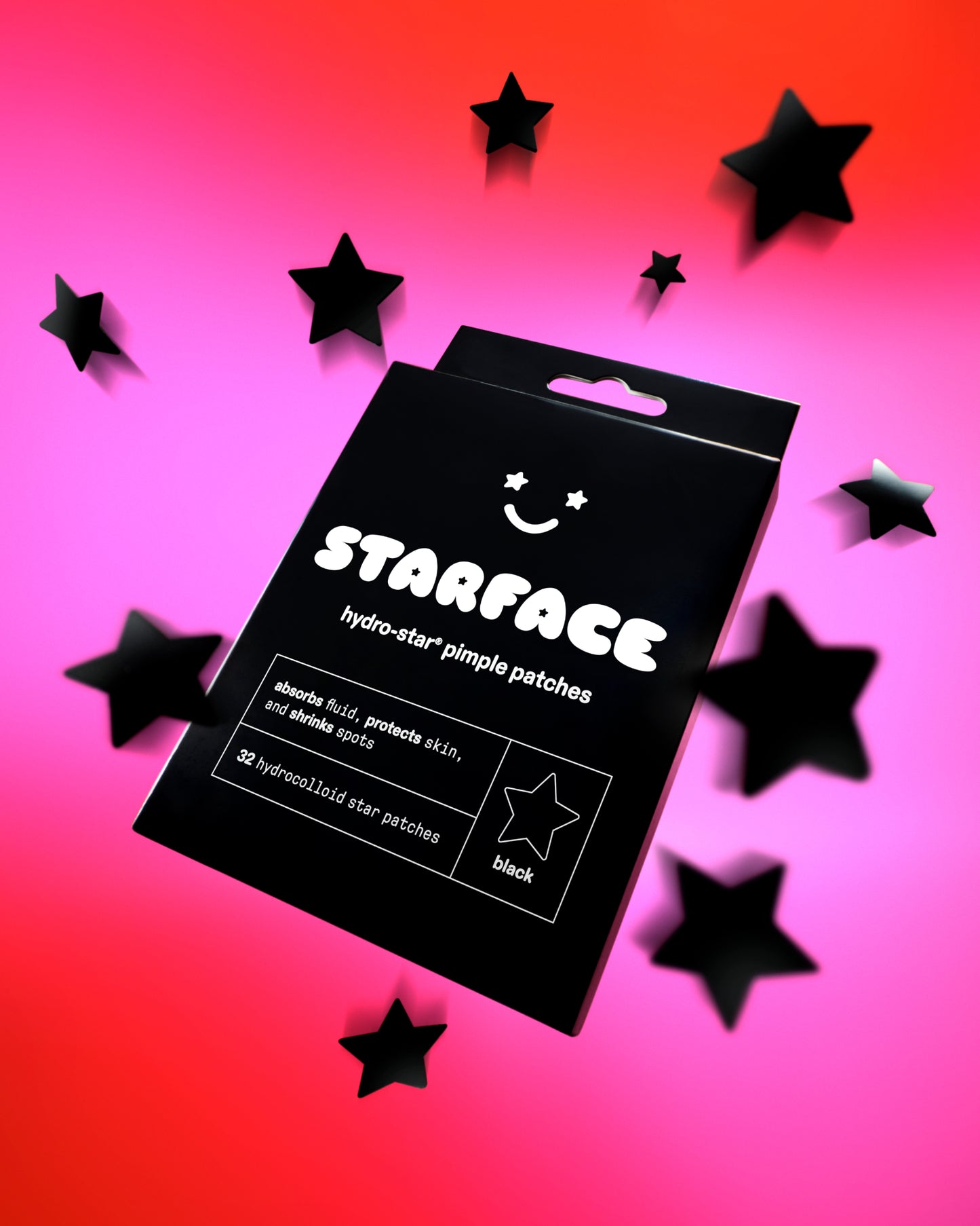 Black Star box on a pink and orange background. Several Starface Hydro-Star® pimple patches surround the box.