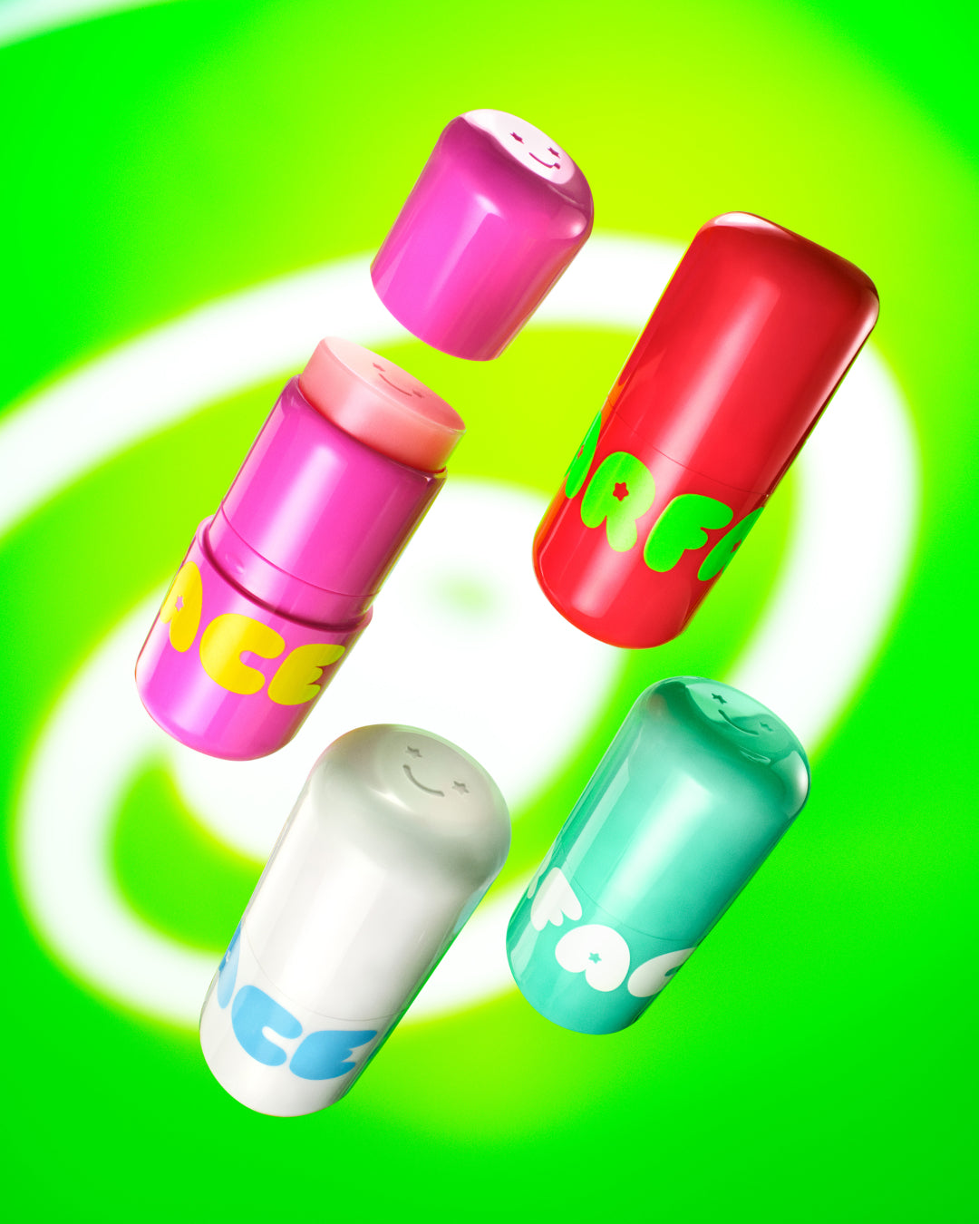 Four Starface Star Balms flavors are in front of a bright green background. Great balms to soothe, hydrate, and moisturize lips.