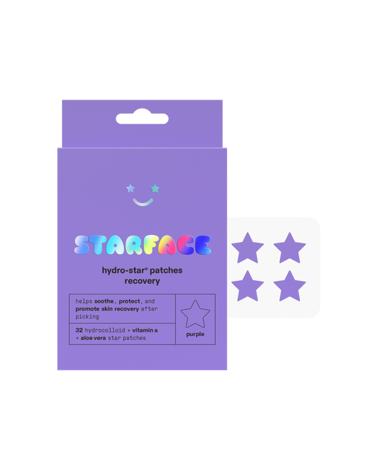 Starface Hydro-Star® Recovery packaging on a white background. A plastic sheet containing four purple Hydro-Star® Recovery pimple patches is next to the packaging.