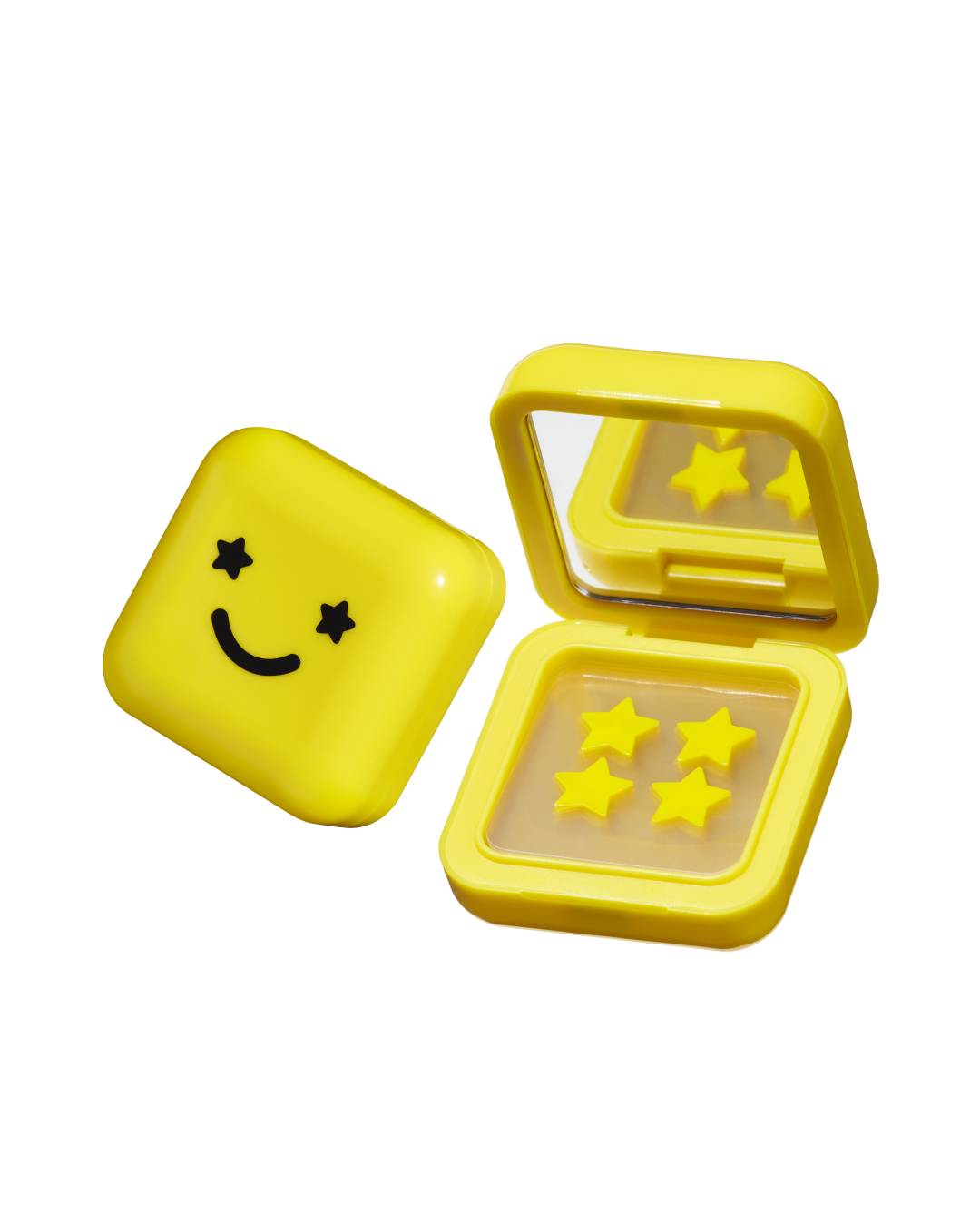 Yellow compact case with a mirror and black smiley face holding Hydro-Star® star-shaped travel pimple patches.