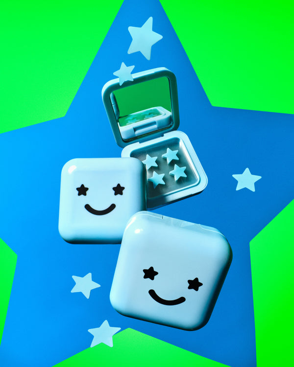 Open Starface blue compact showing Hydro-Star® + Salicylic Acid patches and a mirror. Refillable star patches.