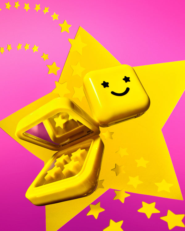 Open Starface yellow compact showing classic Hydro-Star® pimple patches and a mirror. Refillable star-shaped patches.