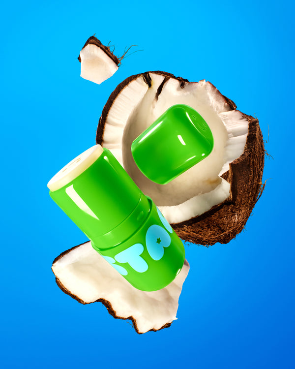 Starface Star Balm® Coconut Blast lip balm uncapped. Shea butter, cocoa butter and coconut oil hydrate lips.