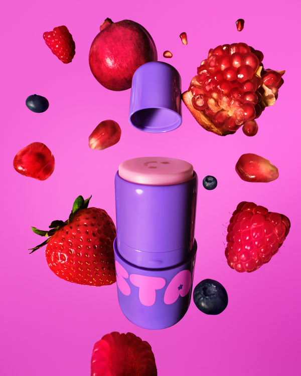 Starface Star Balm® Dream Berry lip balm uncapped. Shea butter, cocoa butter and coconut oil hydrate dry lips.