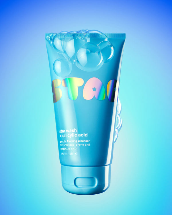 A bottle of Starface Star Wash® + Salicylic Acid cleanser. Oil-free foaming gel with salicylic acid to unclog pores.